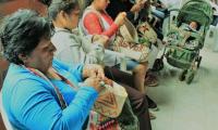 Indigenous Women Artisans hand weave baskets